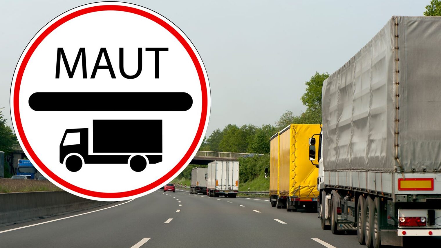 Verkehrsschild zur LKW-Maut vor dem Hintergrund einer Autobahn