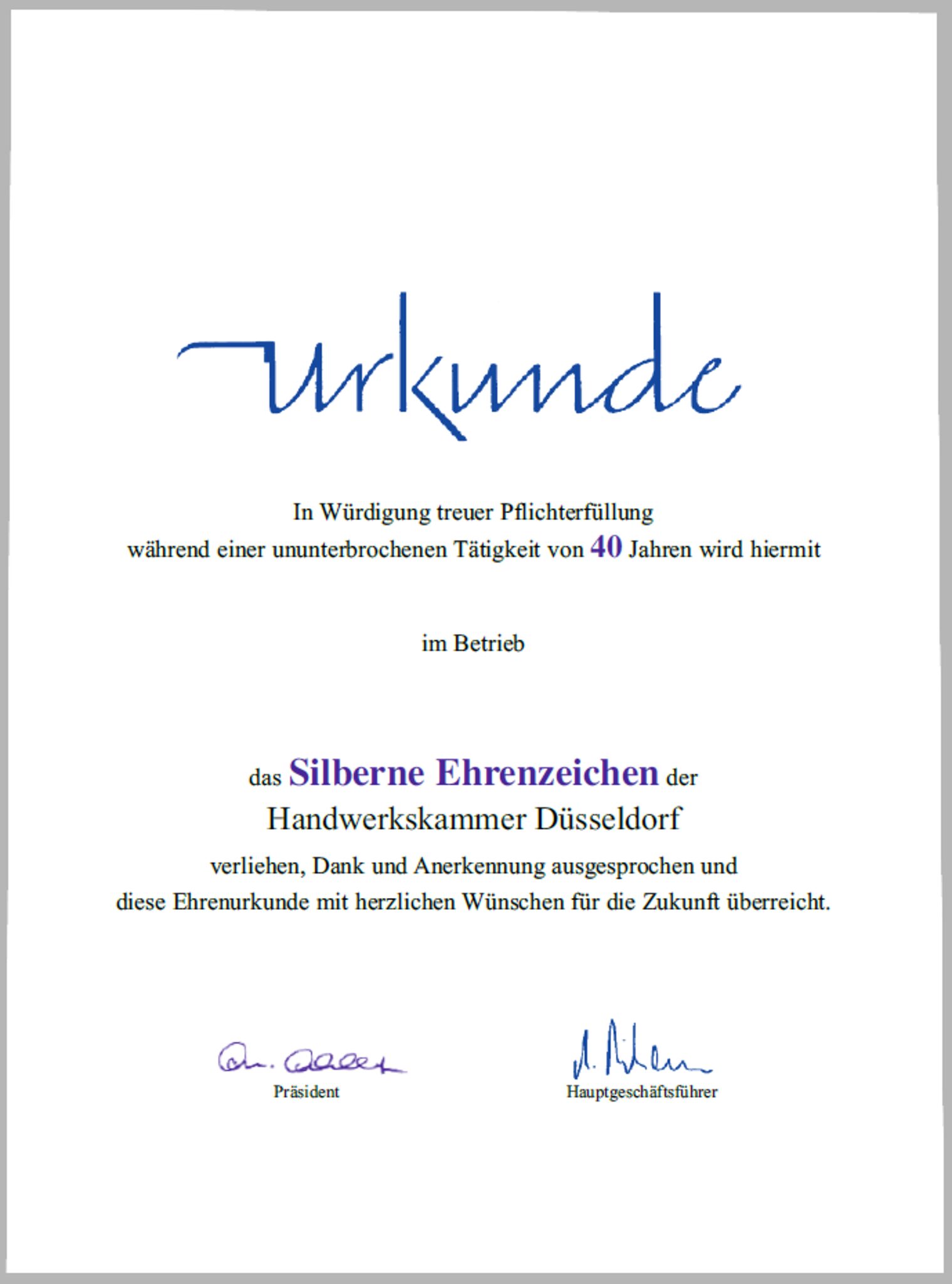 Abbildung einer Urkunde für das Silberne Ehrenzeiche inkl. Unterschriften
